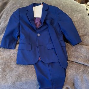 Toddler boy size 4y suit. Worn once for wedding. Brand new condition.